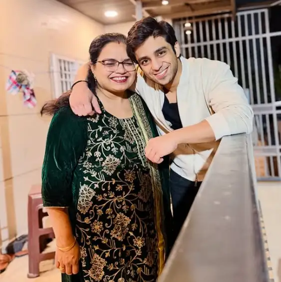 Aarush Bhola with her mother